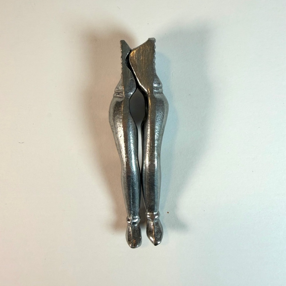 Vintage Cast Aluminum “Lady Legs” Novelty Nutcracker